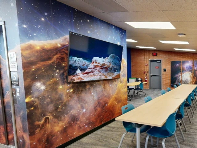 Classroom with galaxy artwork on walls